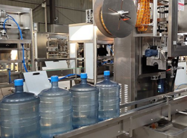 Bottle cap shrink labeling machine
